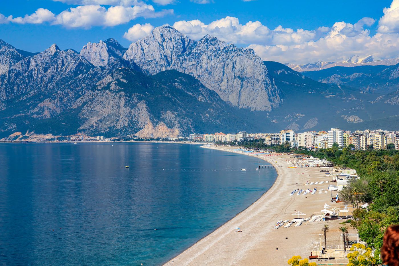 The bay at Antalya seen from above, with the Taurus mountains rising behind a long shoreline